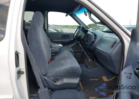 1999 Ford F-150 z USA, uszkodzony, nr VIN 1FTRX18W4XKA38301